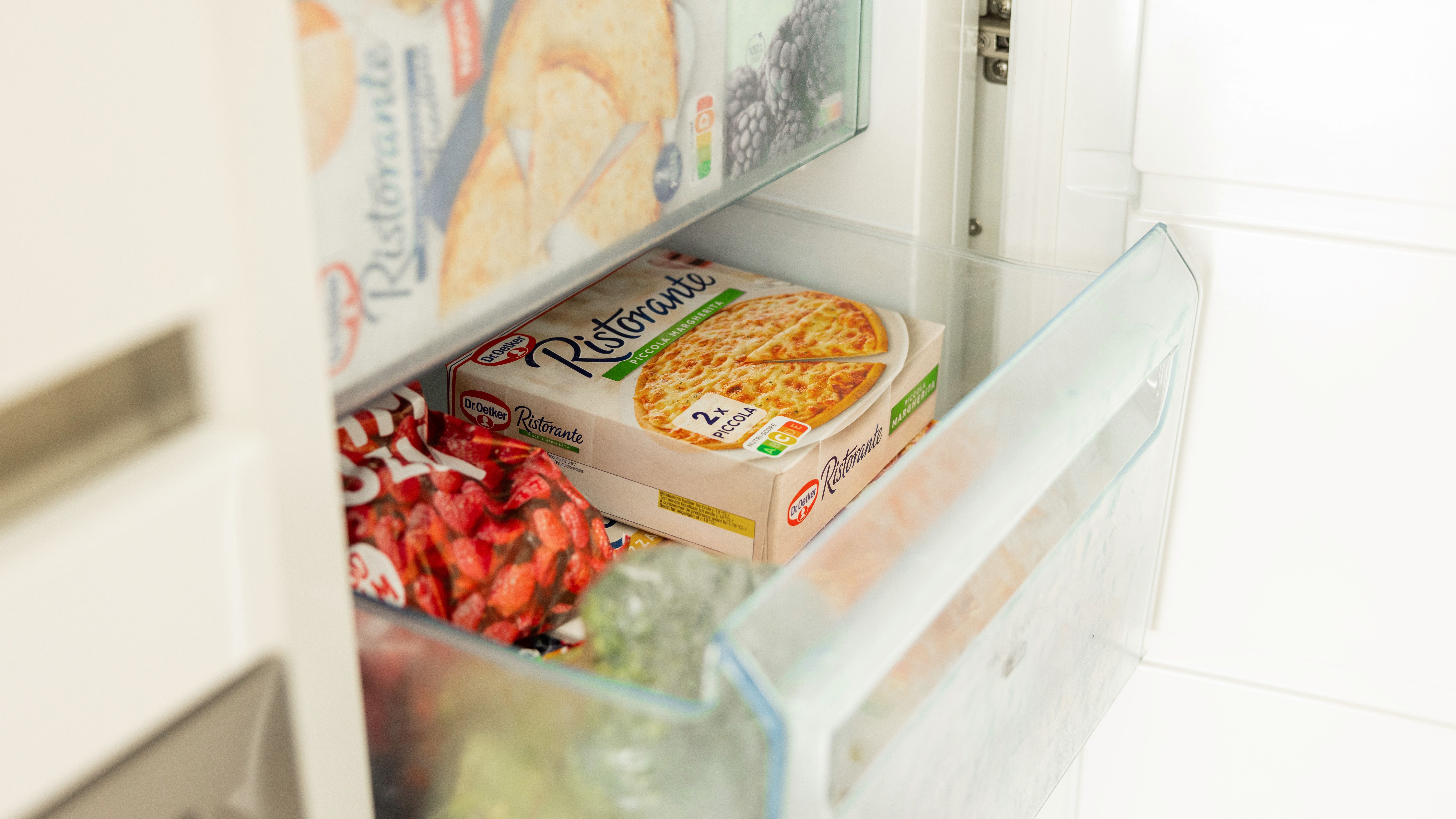 Picture - Restjes en diepvriesgroenten om je pizza's te beleggen